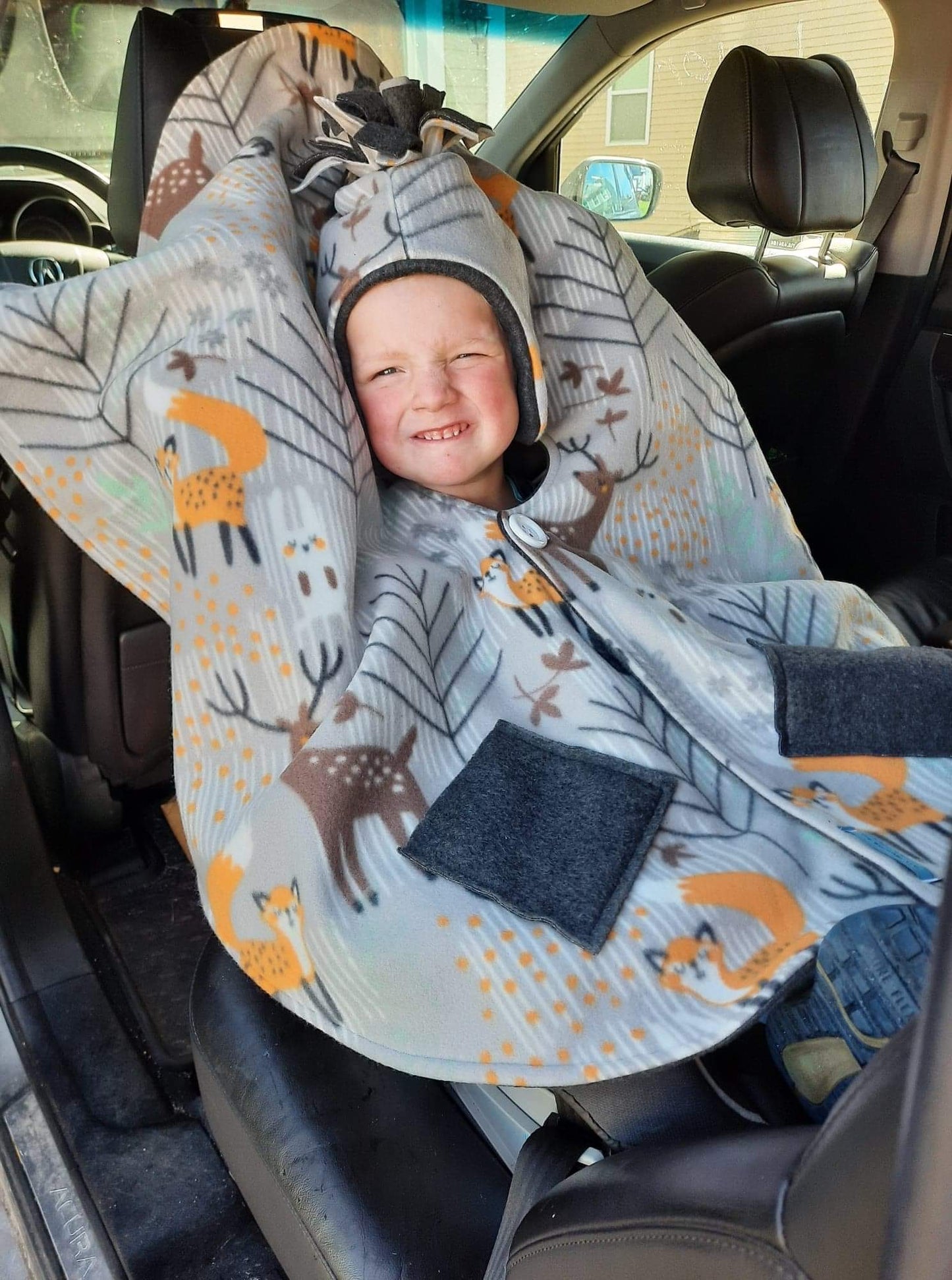 The WarmMe Car seat poncho- woodland animals